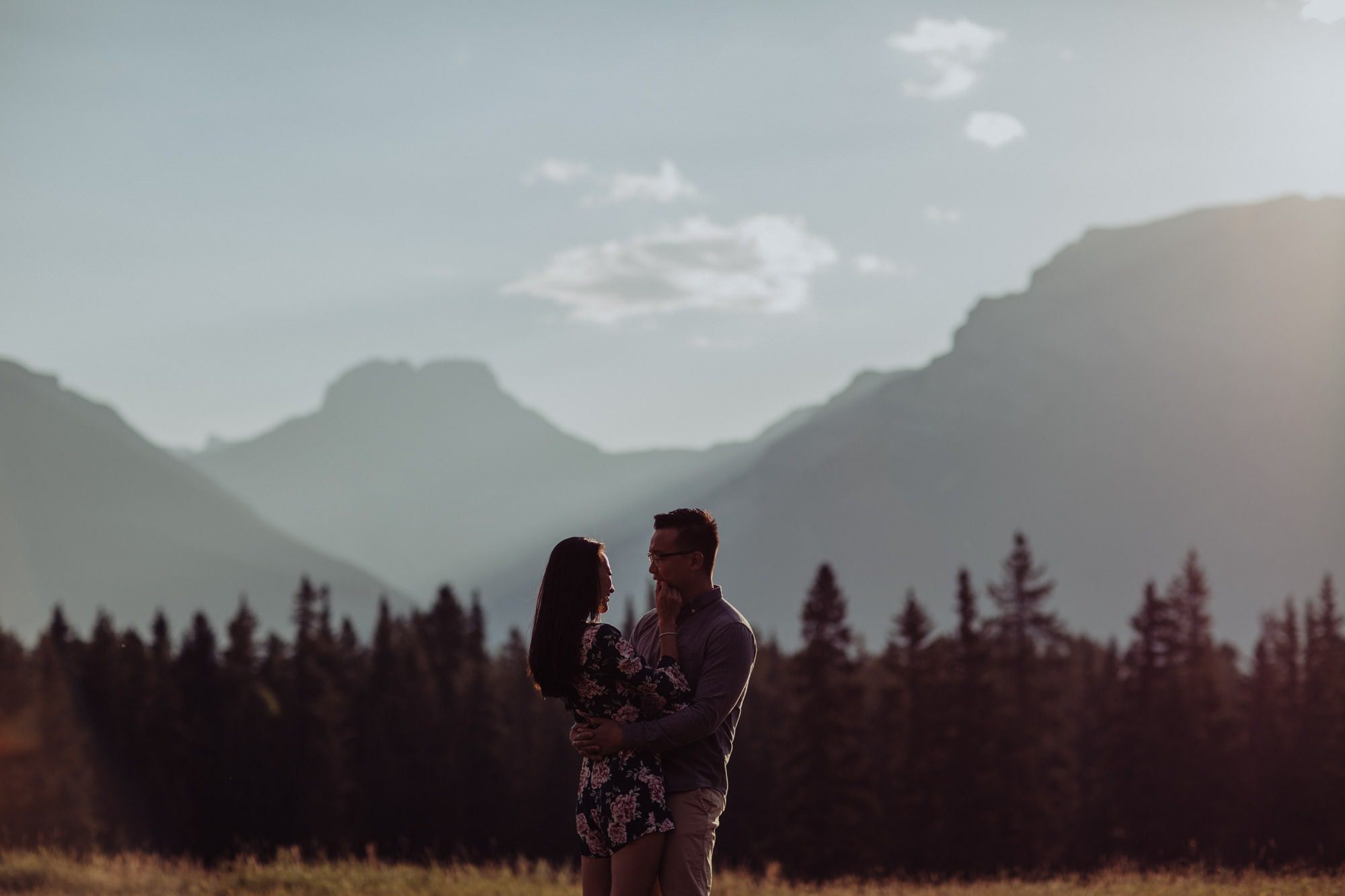 Banff Montreal Wedding Canmore Engagement Quarry Lake Montreal Traveling Destination Photographer Brent Calis Field Mountains Back Light Flare