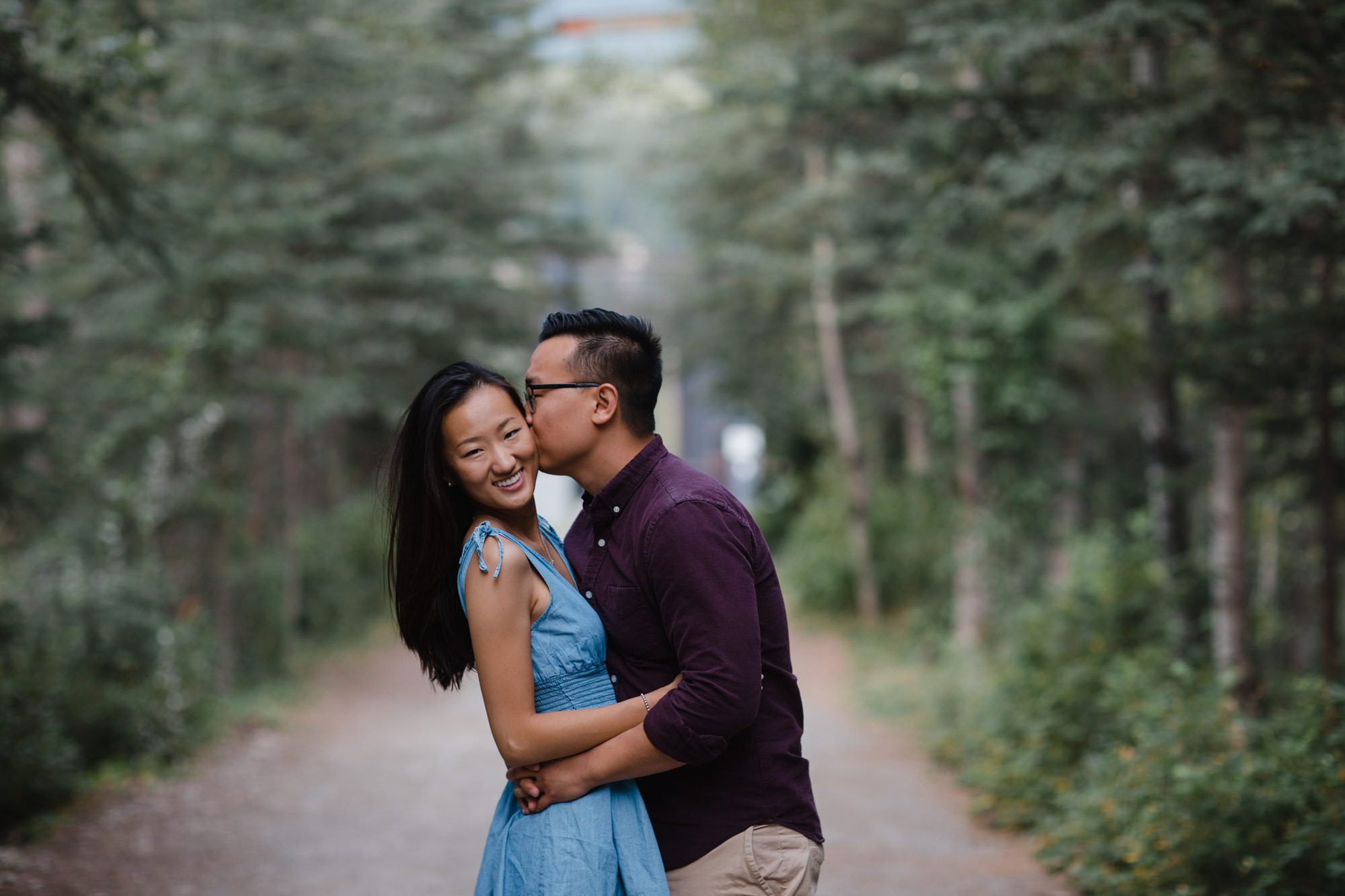 Canmore Engagement Couple Forest Bridge Banff Montreal Wedding