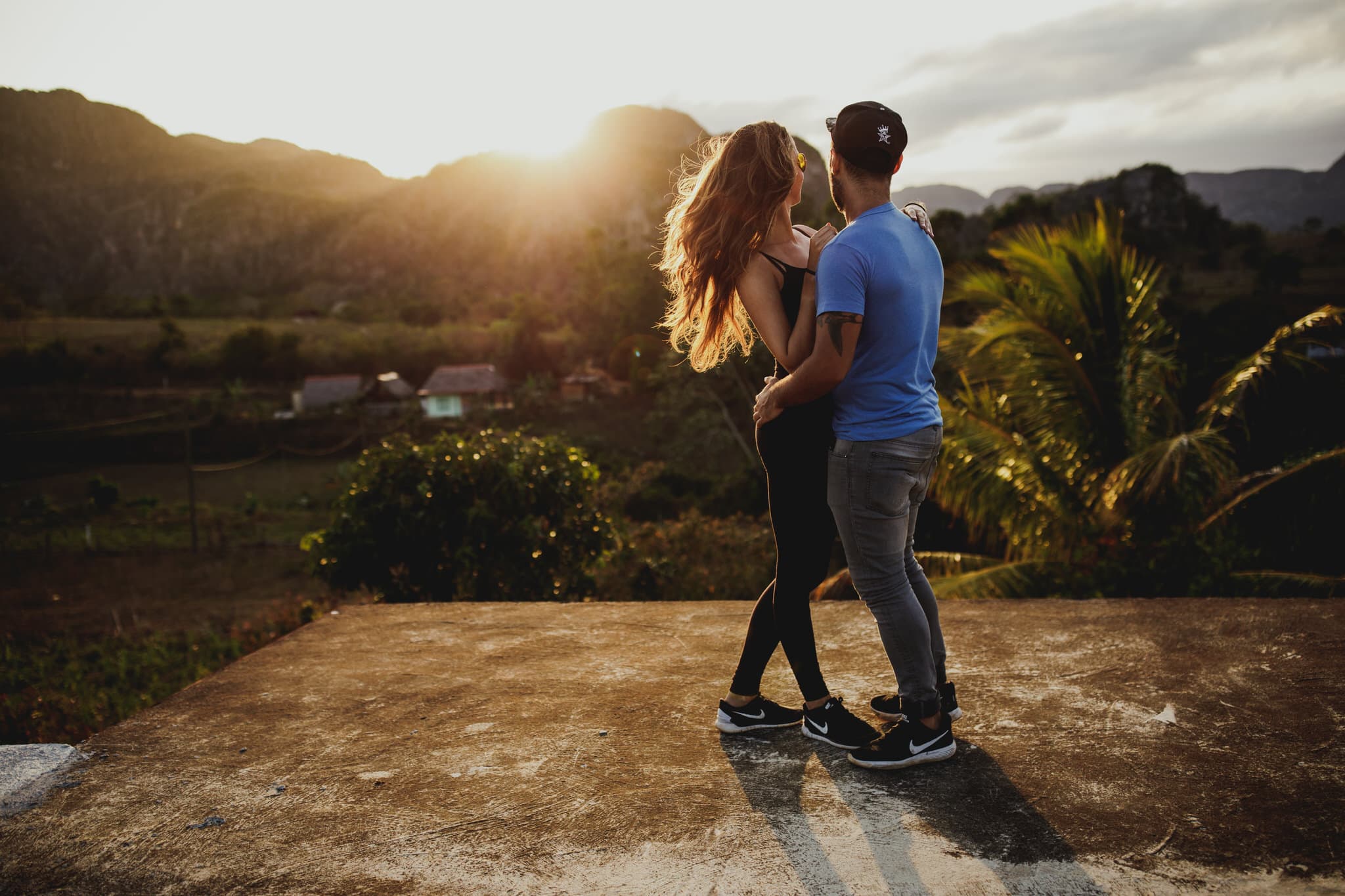 Dancing at sunset in the countryside of Vinales, Cuba. Wedding and travel photographer Brent Calis.