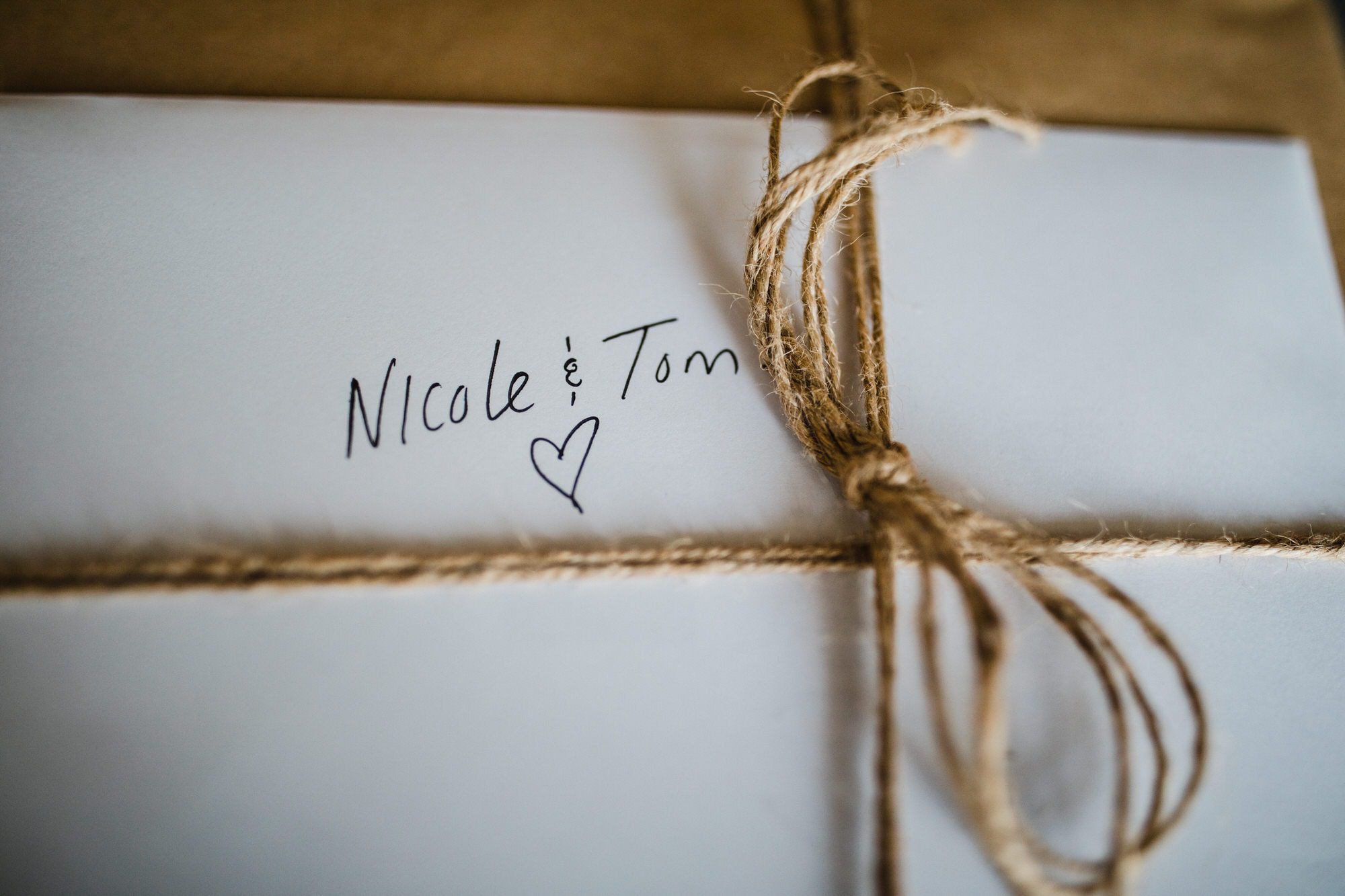 Wedding gift wrapped with twine. Destination wedding photographer Brent Calis.