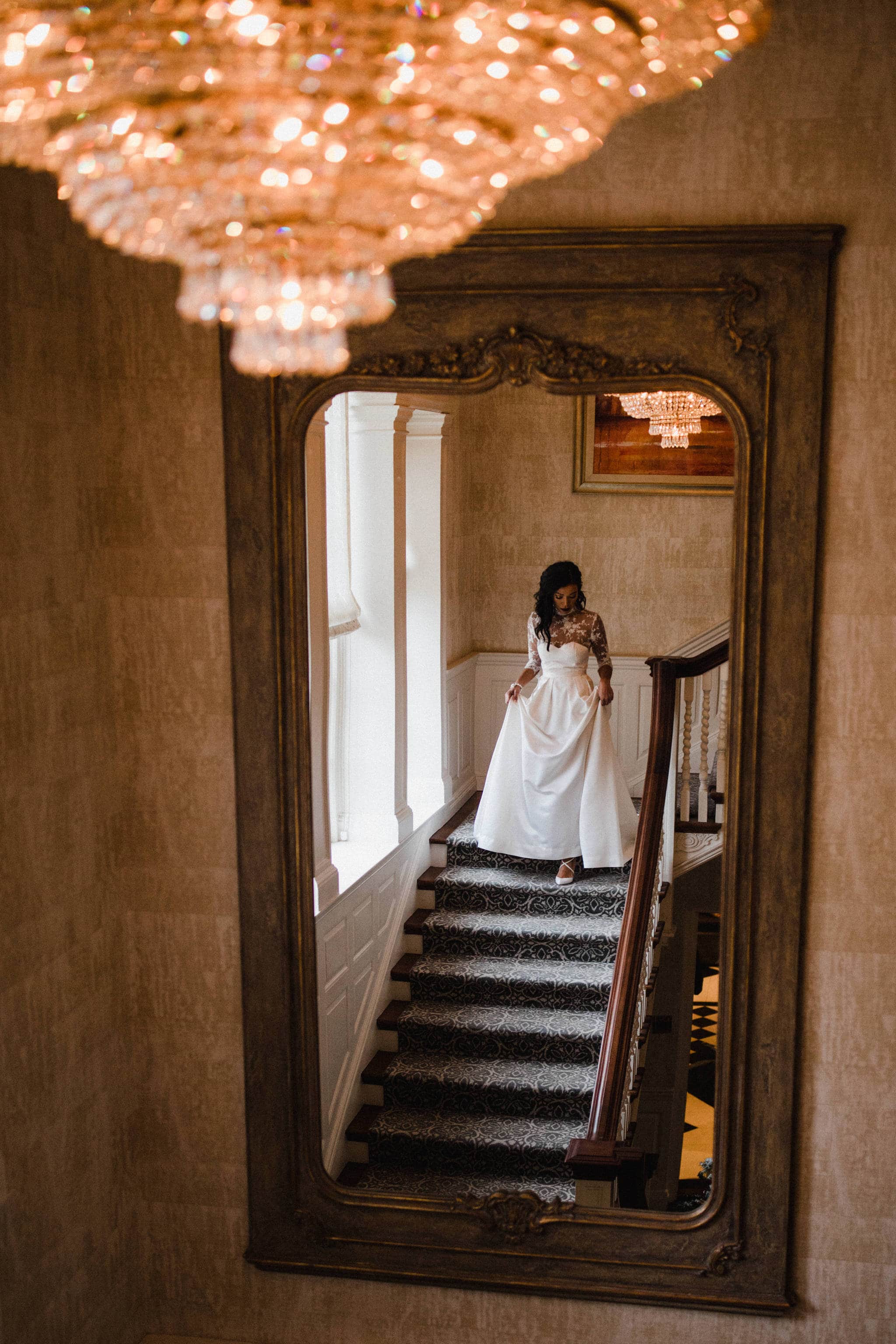 Bride's staircase entrance at Graydon Hall Manor Wedding in Toronto