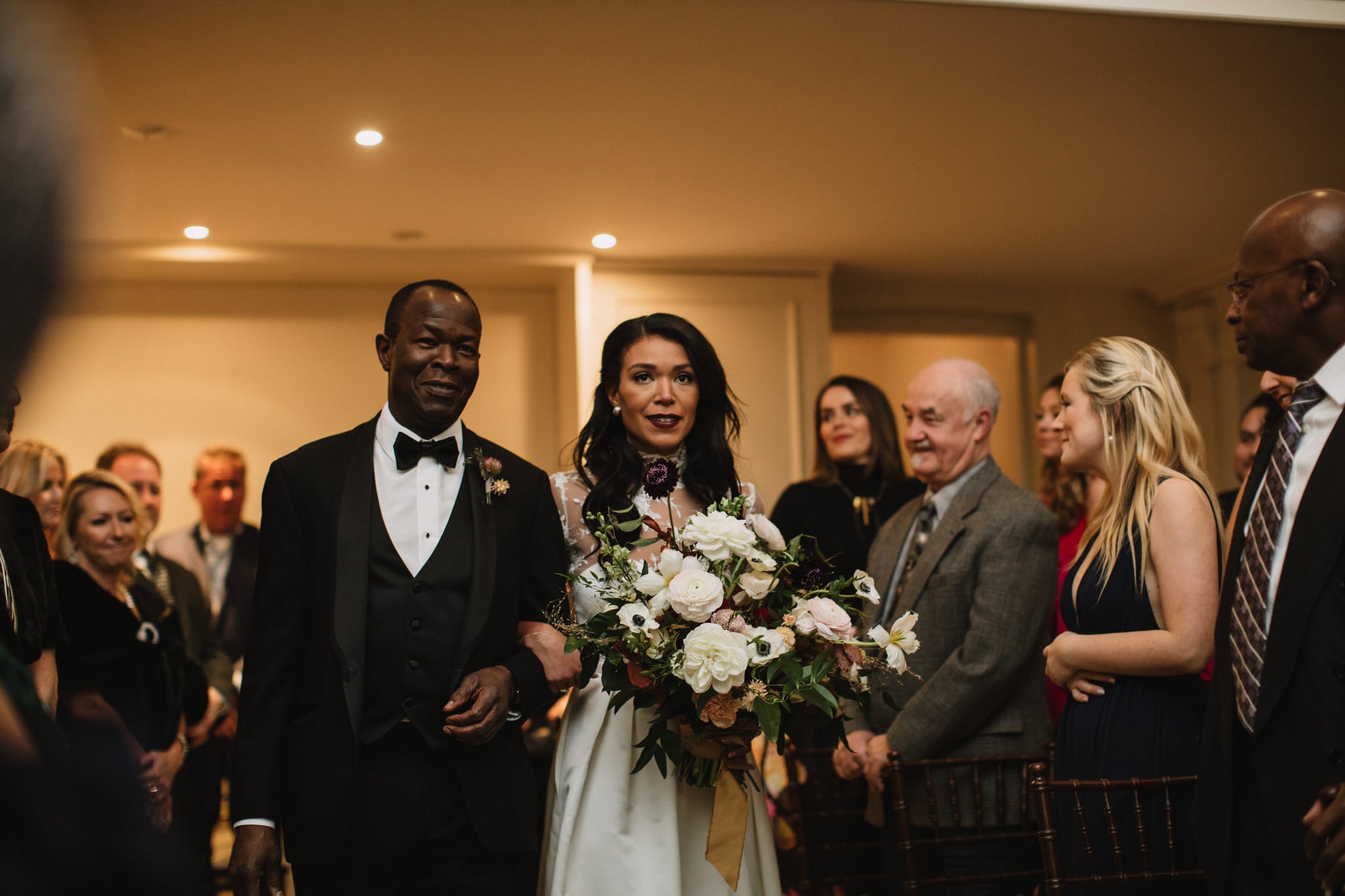 Bride walks down the aisle at Graydon Hall Manor Wedding in Toronto